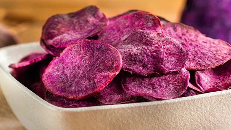 Crispy delicious snack is the finished product from the purple sweet potato dryer